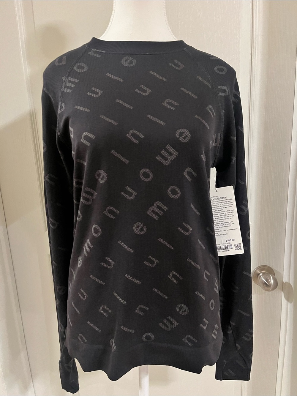 Lululemon- Rest Less Pullover - Black with Grey lululemon lettering. NWT